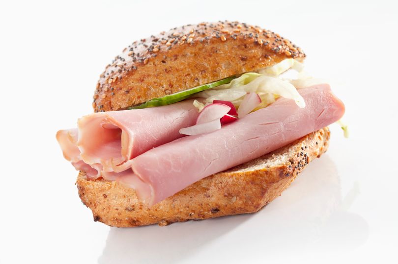 3_Sandwich-of-whole-grain-bread-roll-with-ham-on-white-background-close-up.jpg