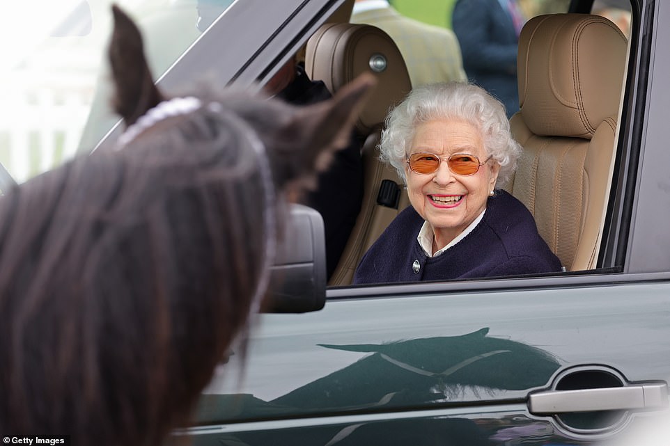 57774193-10812857-Her_Majesty_arrives_at_The_Royal_Windsor_Horse_Show_at_Home_Park-a-1_1652463772883.jpg