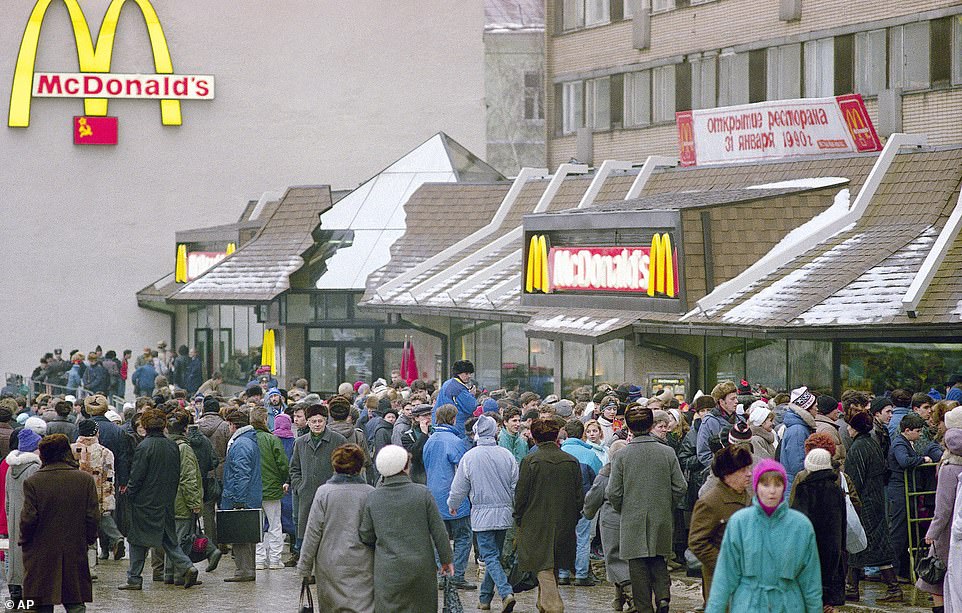 58976787-10908651-Then_Thousands_waited_outside_the_first_ever_McDonald_s_opened_i-a-35_1655045493482.jpeg