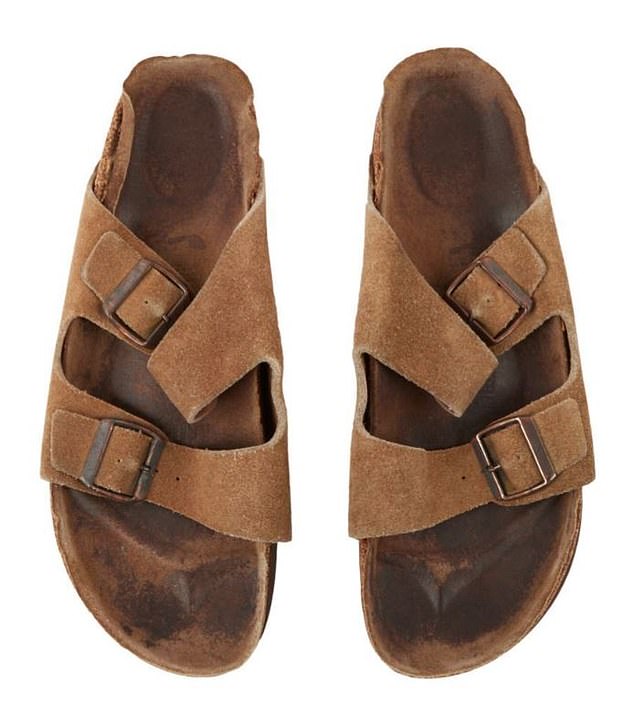 64424785-11414591-A_pair_of_old_used_Birkenstock_sandals_belonging_to_Apple_founde-a-35_1668121013793.jpg