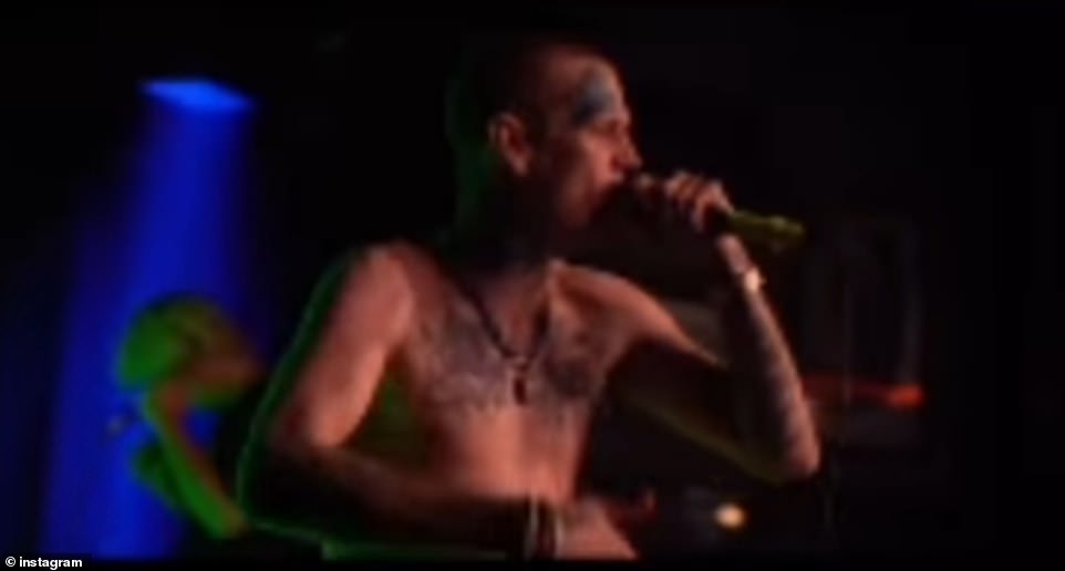 64228157-11394235-In_the_embattled_rapper_s_last_performance_before_his_untimely_d-a-23_1667711835926.jpg
