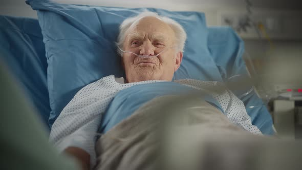 Hospital Ward Portrait of Old Man in Bed by Gorodenkoffs | VideoHive